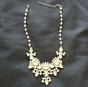 Silver Statement Necklace with Ornate Centerpiece and Pearl Design